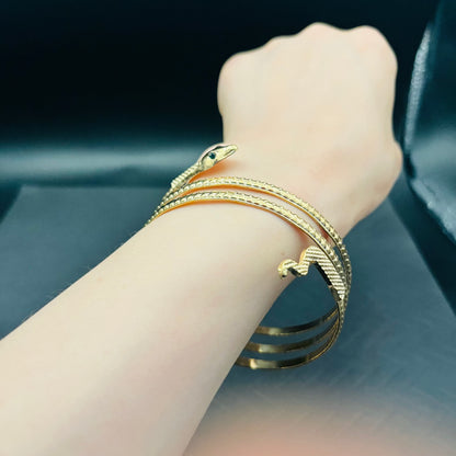Emerald-Eyed Gold Snake Arm & Wrist Bracelet | Statement Serpent Jewelry