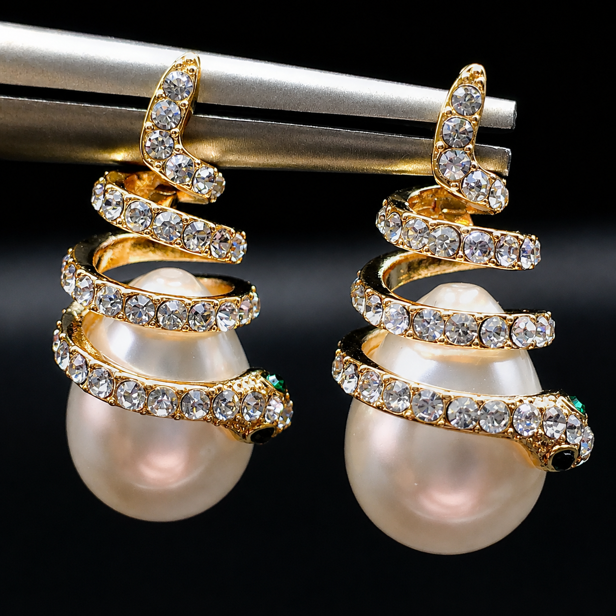 snake pearl earrings