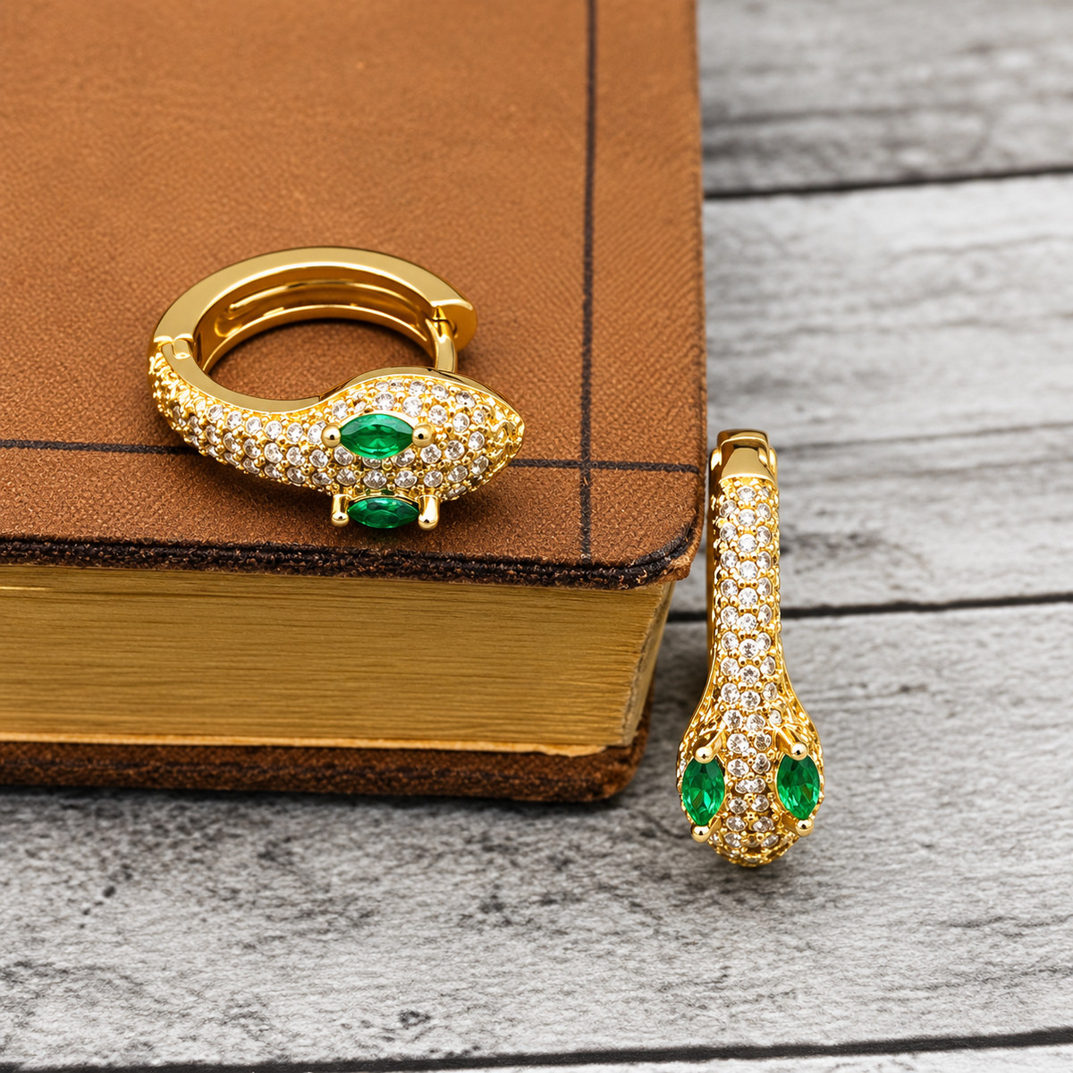 Gold Snake Huggie Hoop Earrings with Green Crystal Eyes | Gothic Serpent Jewelry