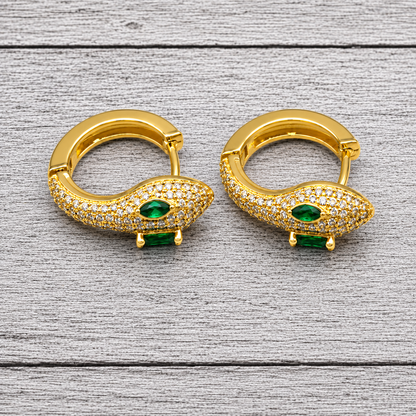 Gold Snake Huggie Hoop Earrings with Green Crystal Eyes | Gothic Serpent Jewelry