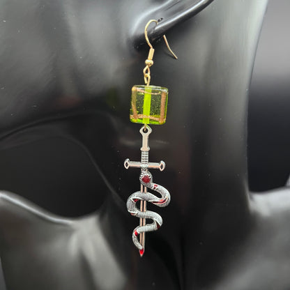 Silver Snake Sword Dangle Earrings – Green Glass Cube Beads, Gothic Fantasy Statement Jewelry