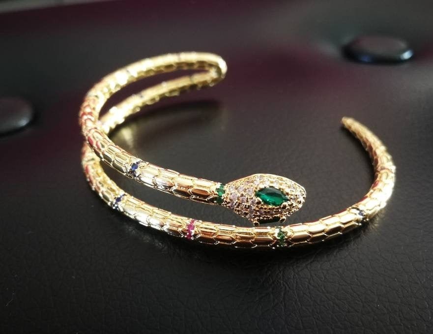 Gold Serpent Bracelet with Emerald Eyes and Cubic Zirconia - Statement Jewelry