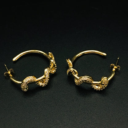 Victorian Gold Snake Hoop Earrings -  Serpent Huggie Hoops with Emerald Green Crystal Eyes | Gothic Gold Statement Earrings