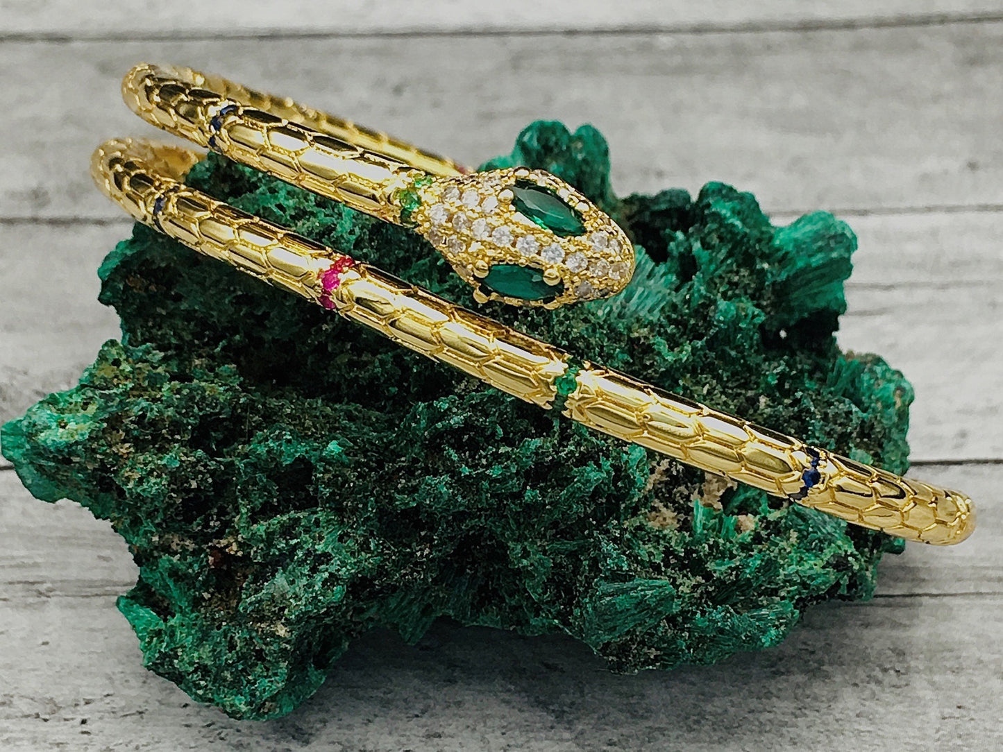 Gold Serpent Bracelet with Emerald Eyes and Cubic Zirconia - Statement Jewelry