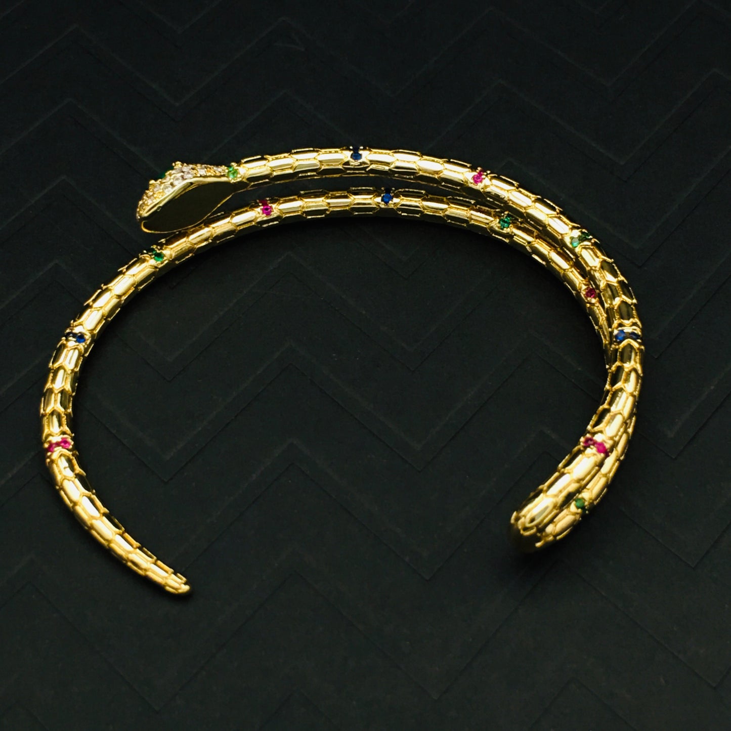 Gold Serpent Bracelet with Emerald Eyes and Cubic Zirconia - Statement Jewelry