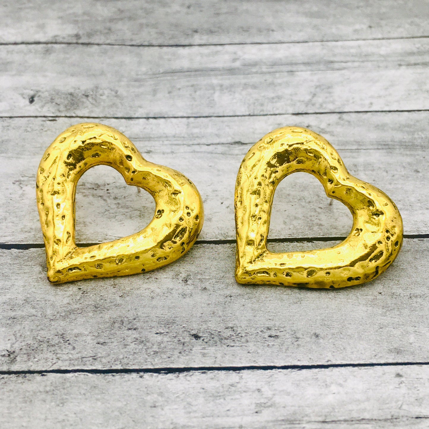 gold heart stud earrings