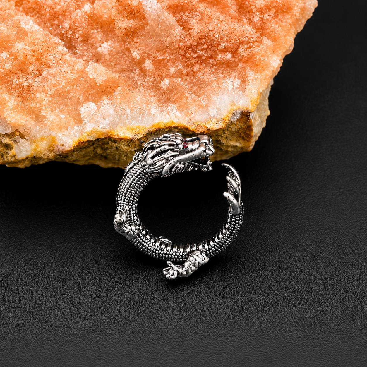 A silver dragon-themed ring 